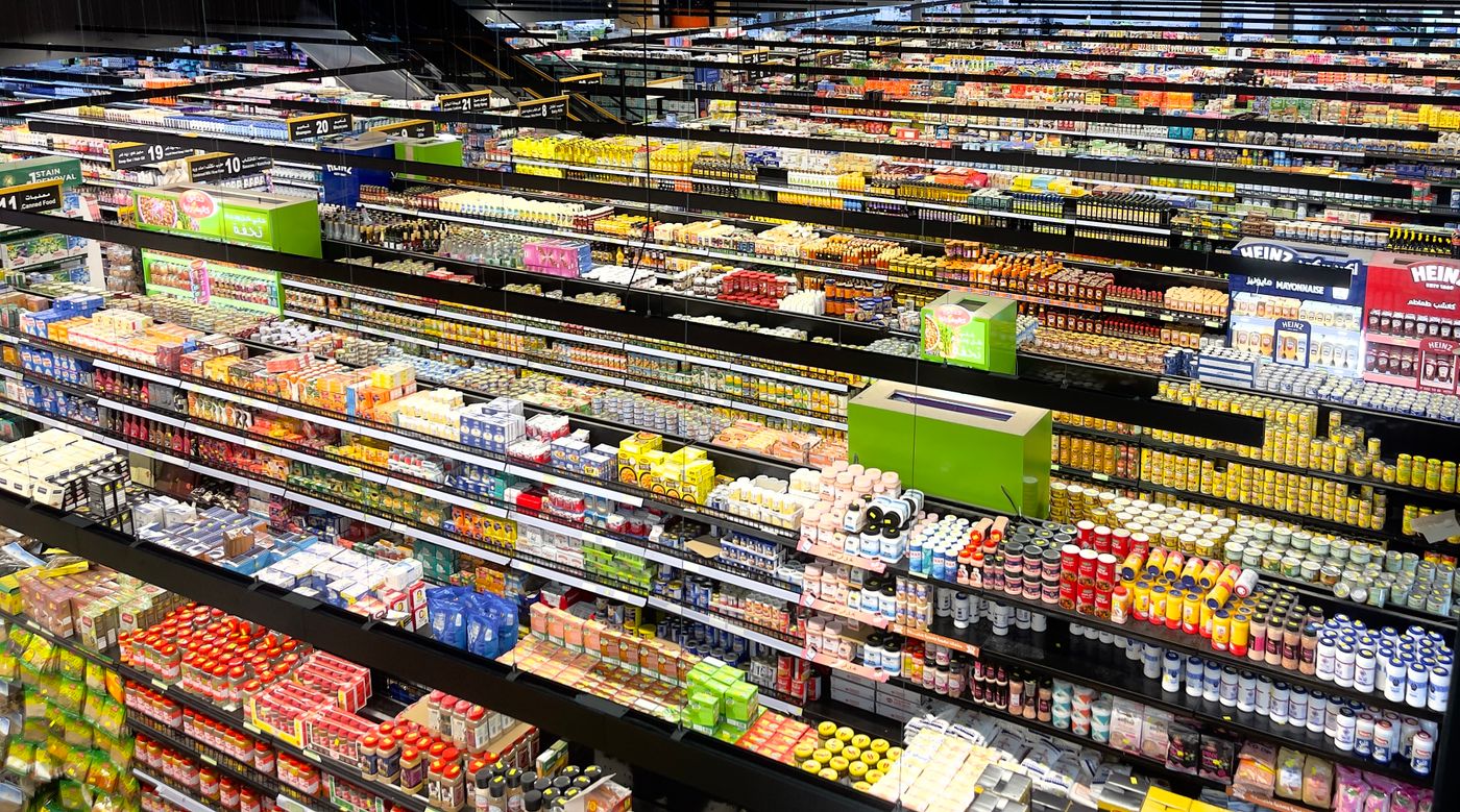 Colorful supermarket aisles from above