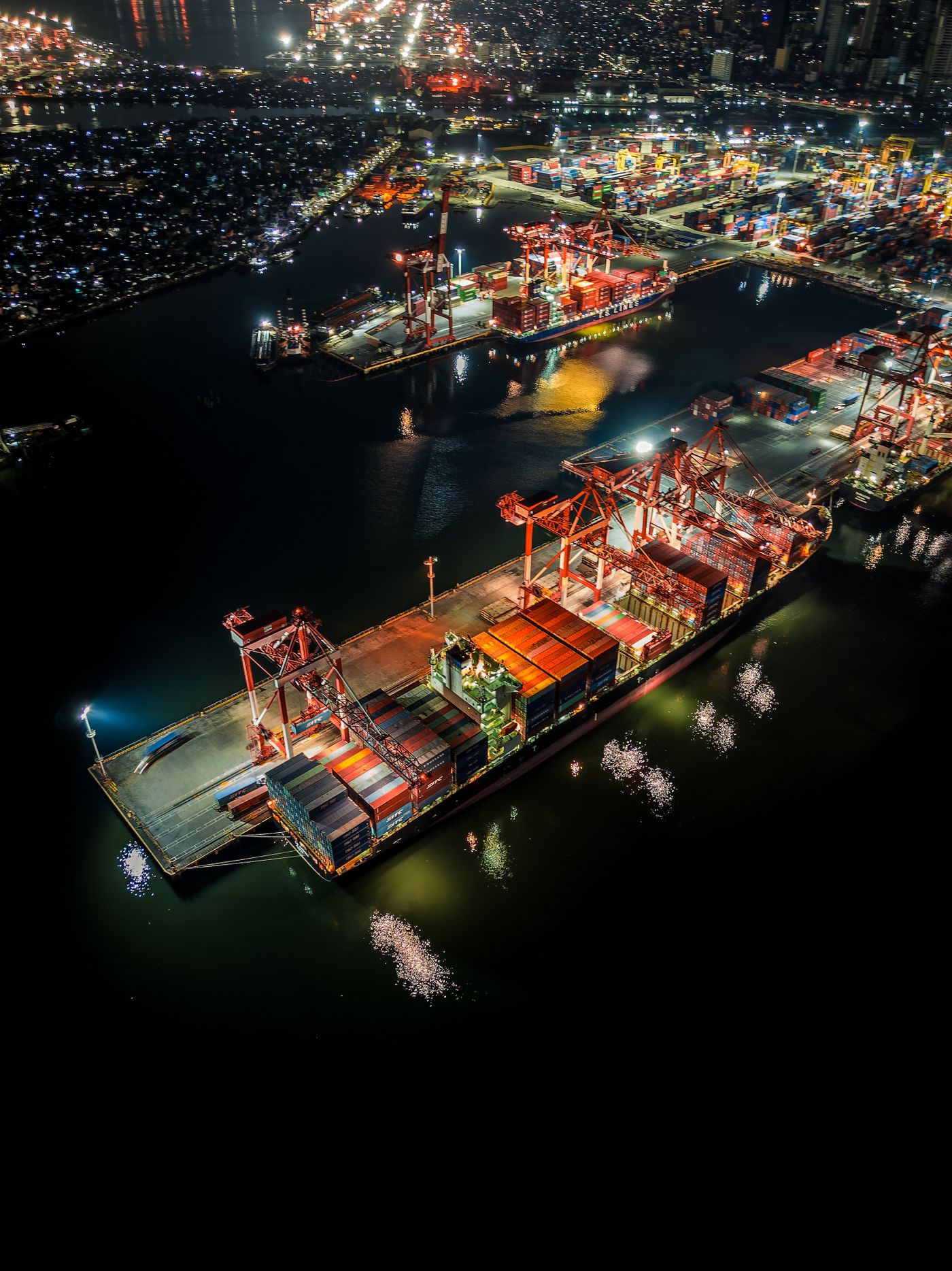 Illuminated container port at night